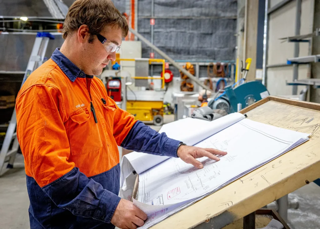 Birdon Staff looking at vessel design